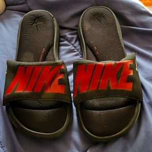 Mens size 10/11 Nike slides
